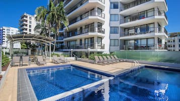 Outdoor pool, open 8:00 AM to 8:00 PM, pool loungers