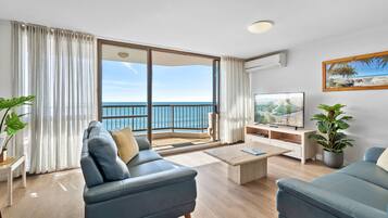 Two-Bedroom Apartment - Superior Ocean View | Living area | 55-inch flat-screen TV with cable channels, TV
