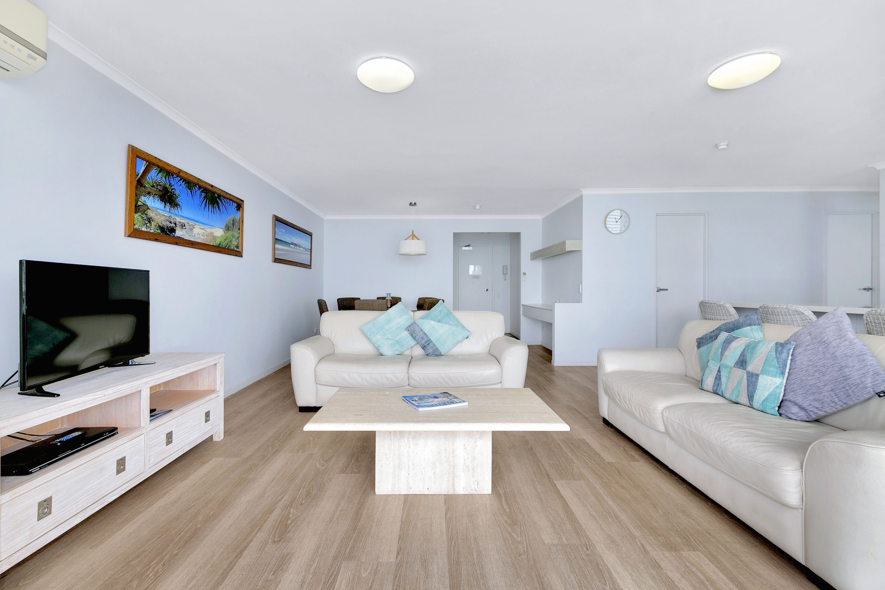 Two-Bedroom Apartment - Ocean View | Living room | 55-inch flat-screen TV with cable channels, TV