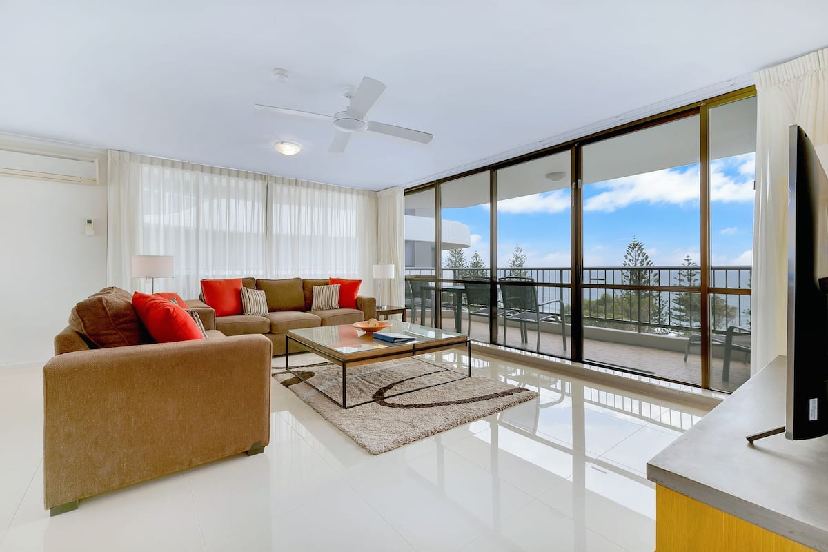 Three-Bedroom Apartment - Ocean View | Living room | 55-inch flat-screen TV with cable channels, TV