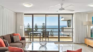 Three-Bedroom - Superior Ocean View | Living area | 55-inch flat-screen TV with cable channels, TV