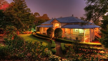 Manor House (4 Ensuite Bedrooms) | Front of property – evening/night