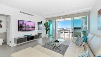 1 Bedroom Superior Water View Apartment | Living area | 50-inch flat-screen TV with digital channels, TV, streaming services