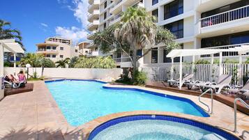 Outdoor pool, free pool cabanas, pool umbrellas