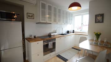 Deluxe-Loft | Eigene Küche | Kühlschrank, Mikrowelle, Herdplatte, Wasserkocher mit Kaffee-/Teezubehör