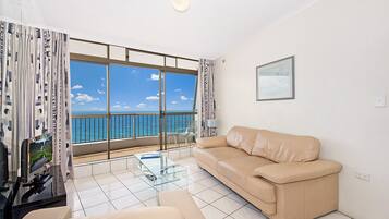 Apartment, 1 Bedroom | Living area | Flat-screen TV