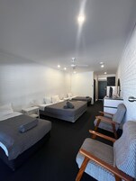 Family Room | Desk, laptop workspace, blackout drapes, soundproofing