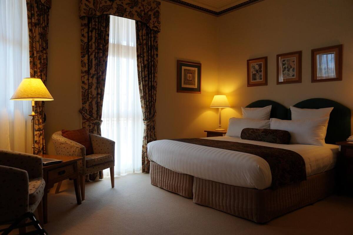 minibar, blackout curtains, iron/ironing board, cots/infant beds