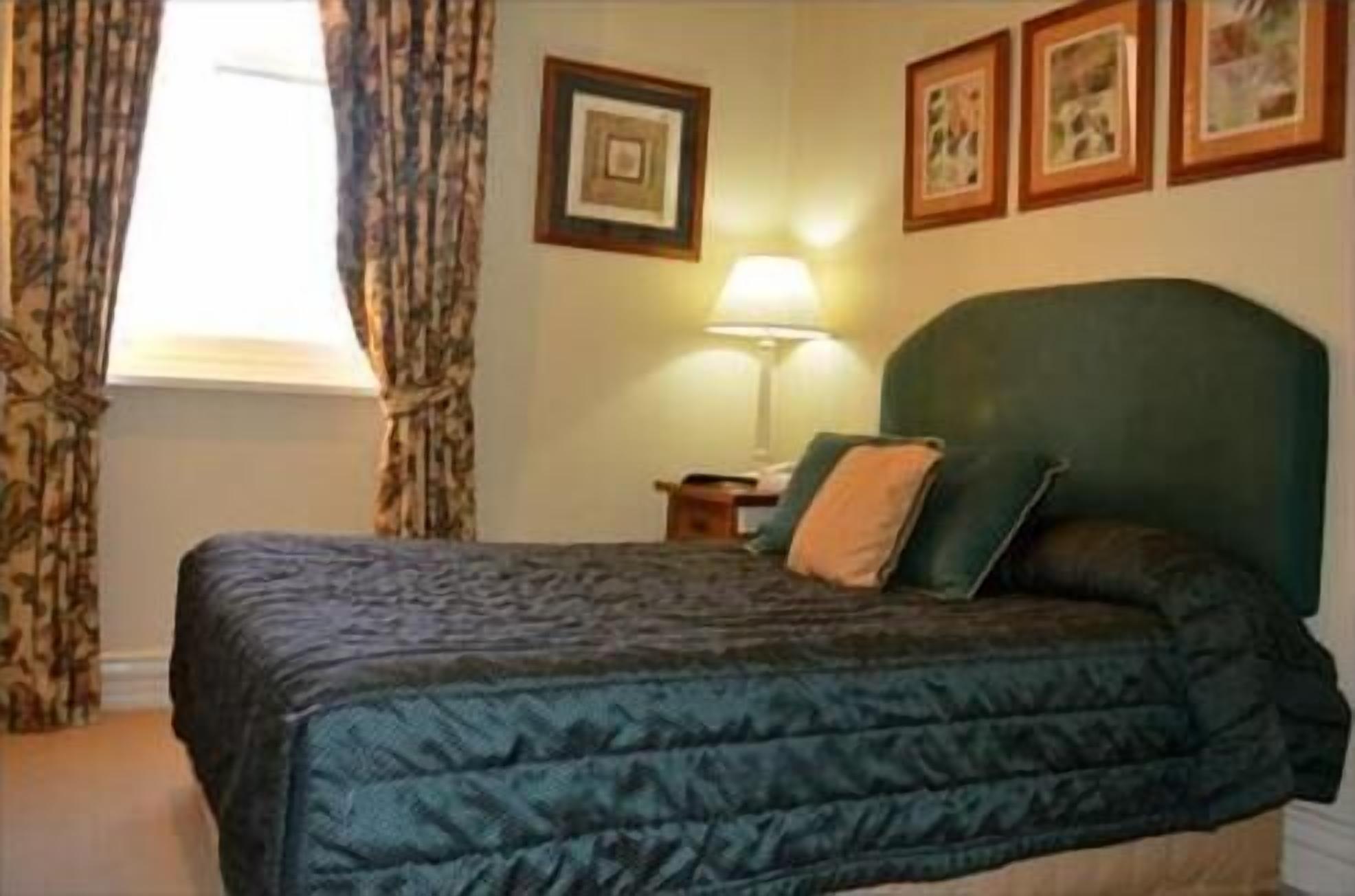 minibar, blackout curtains, iron/ironing board, cots/infant beds