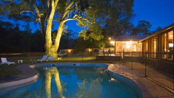 Outdoor pool, open 8 AM to 8 PM, pool loungers