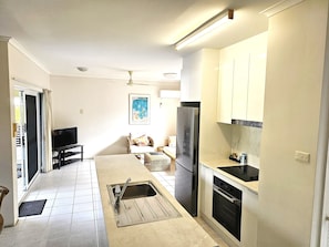 First Floor Apartment | Private kitchen | Full-size fridge, microwave, oven, stovetop