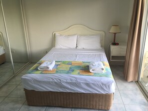 Suite with Balcony | Iron/ironing board, free cribs/infant beds, rollaway beds, free WiFi