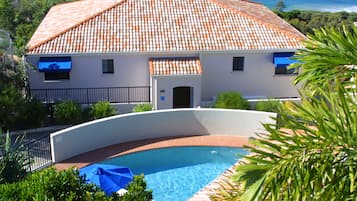 2 outdoor pools, pool umbrellas, pool loungers