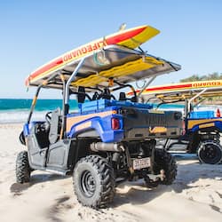 On the beach, white sand, beach towels