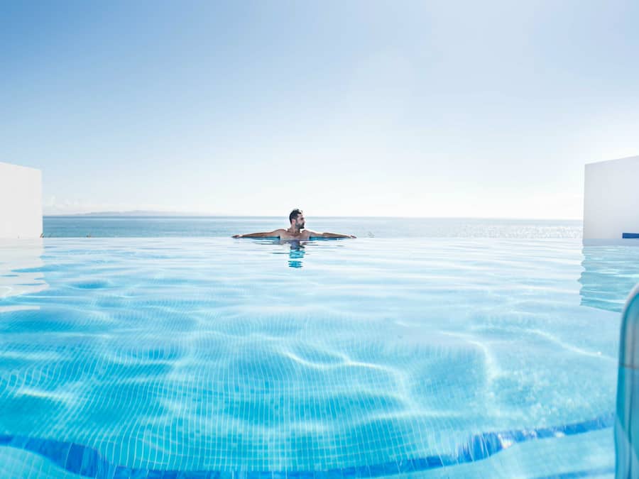 Outdoor pool, pool umbrellas, pool loungers