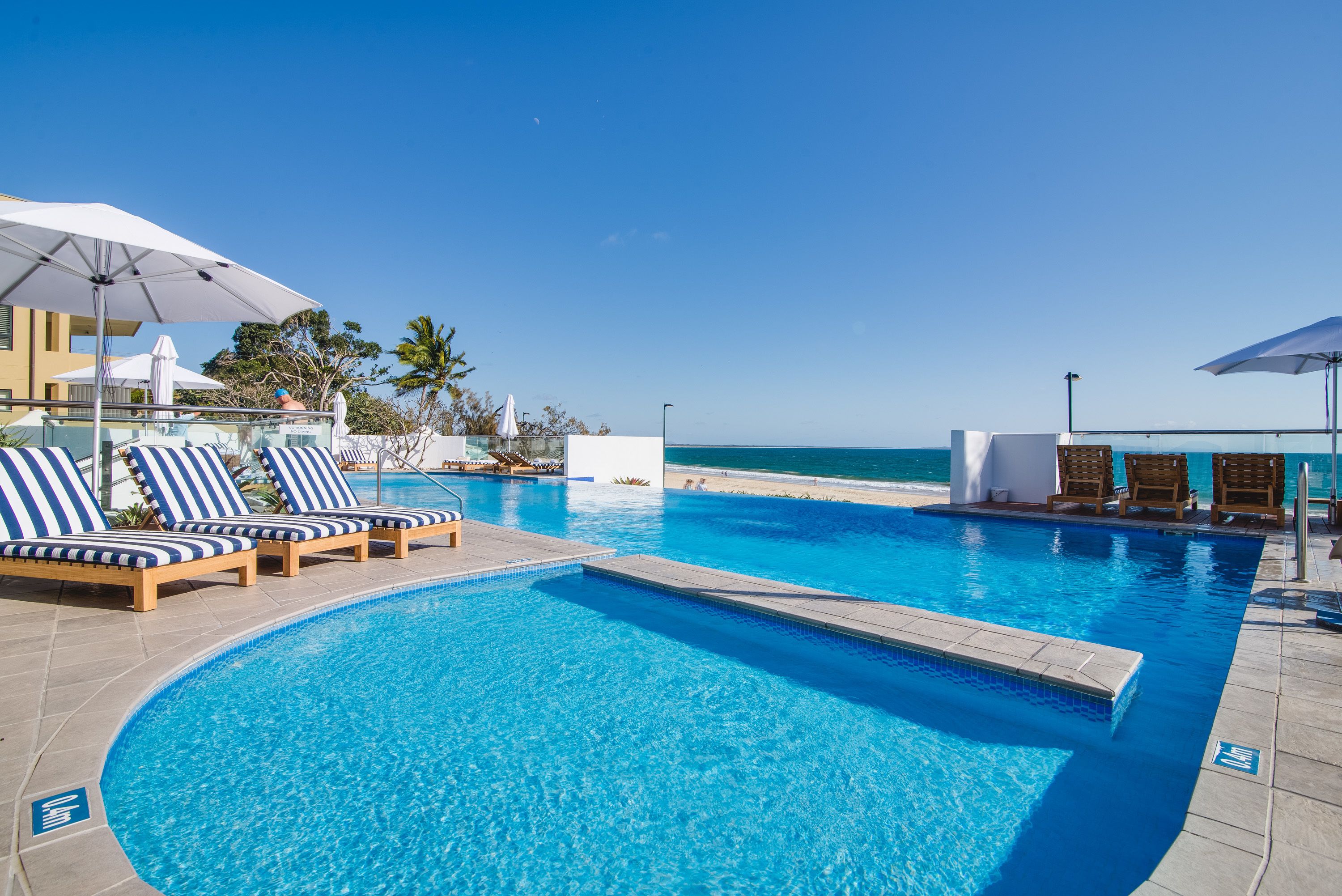 Outdoor pool, pool umbrellas, pool loungers