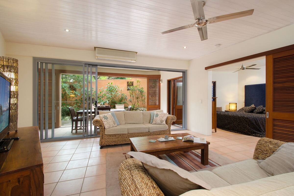 Luxury Courtyard Apartment (Queen) | Living area | LED TV, DVD player