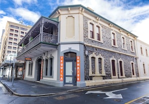 A building with a corner entrance, a balcony, and a sign that reads 'TEQUILA SUNRISE'. - Tequila Sunrise Adelaide (Adelaide)