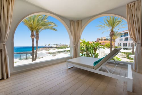 Superior Suite, Sea View | In-room safe, desk, laptop workspace, blackout drapes