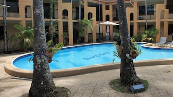 Outdoor pool, pool umbrellas, sun loungers