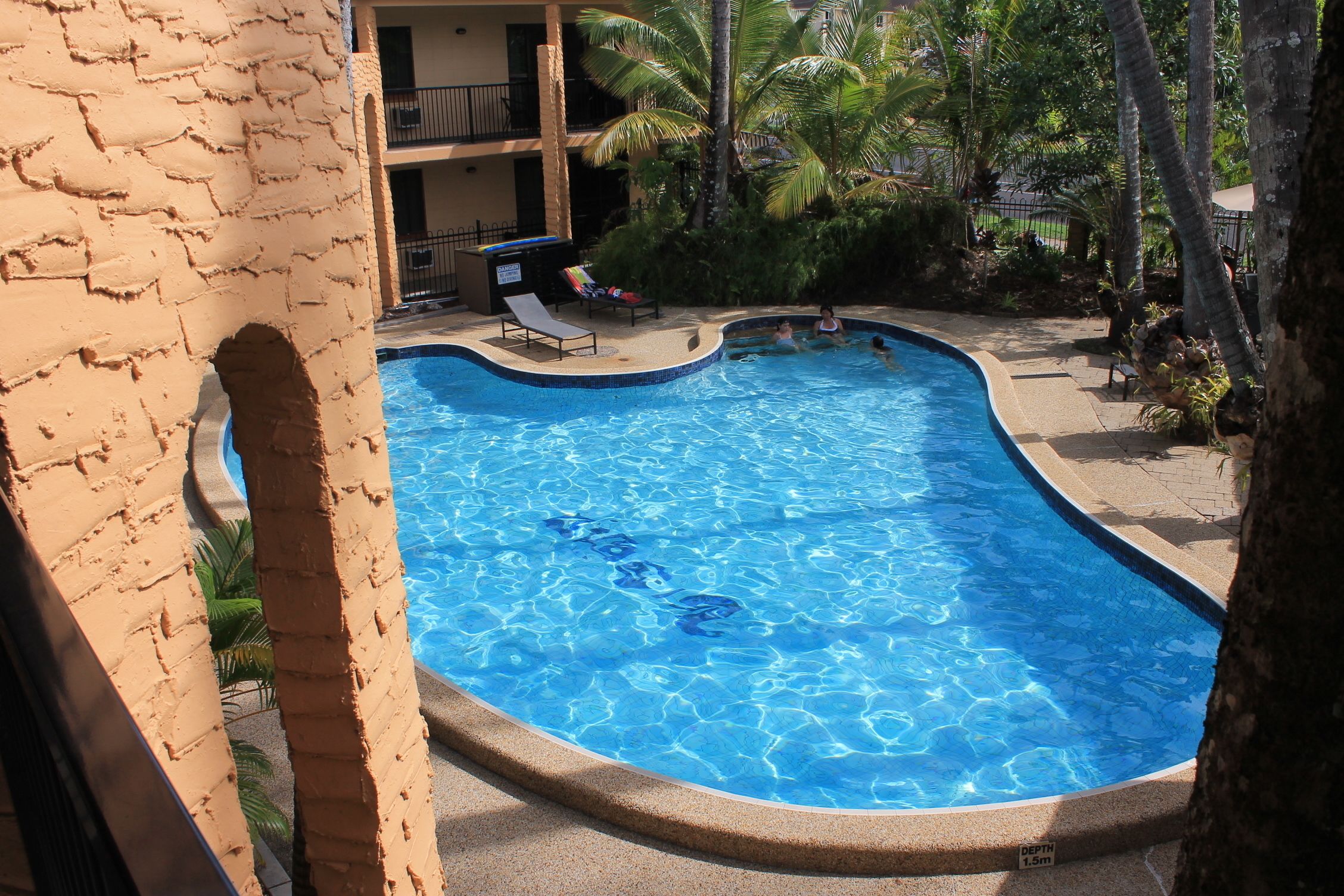 Outdoor pool, pool umbrellas, pool loungers