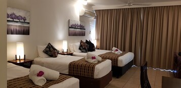 Family Studio, Multiple Beds | Pillowtop beds, in-room safe, desk, soundproofing