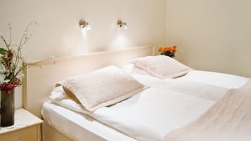 Cortinas blackout, wifi gratis y ropa de cama
