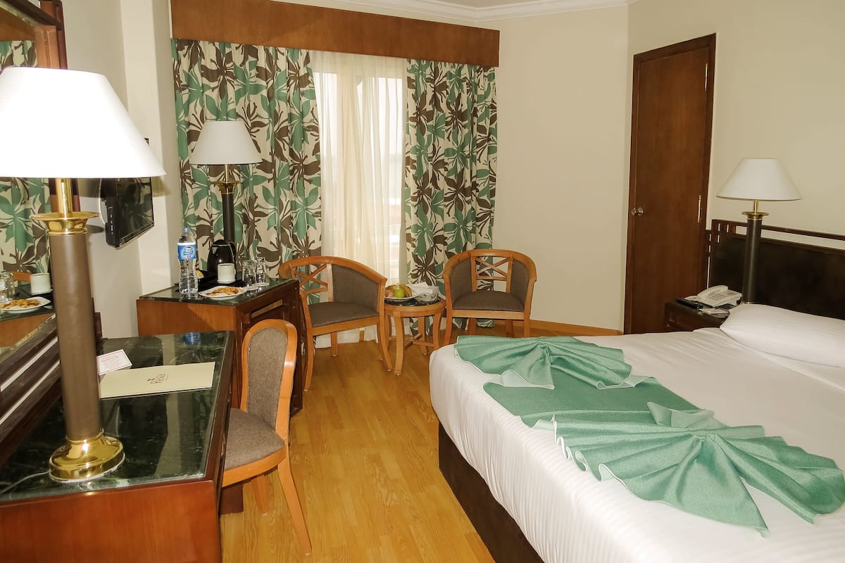 Room, Smoking, Canal View | Egyptian cotton sheets, premium bedding, pillowtop beds, minibar