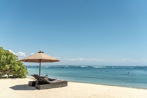 Private beach, white sand, free beach shuttle, sun loungers