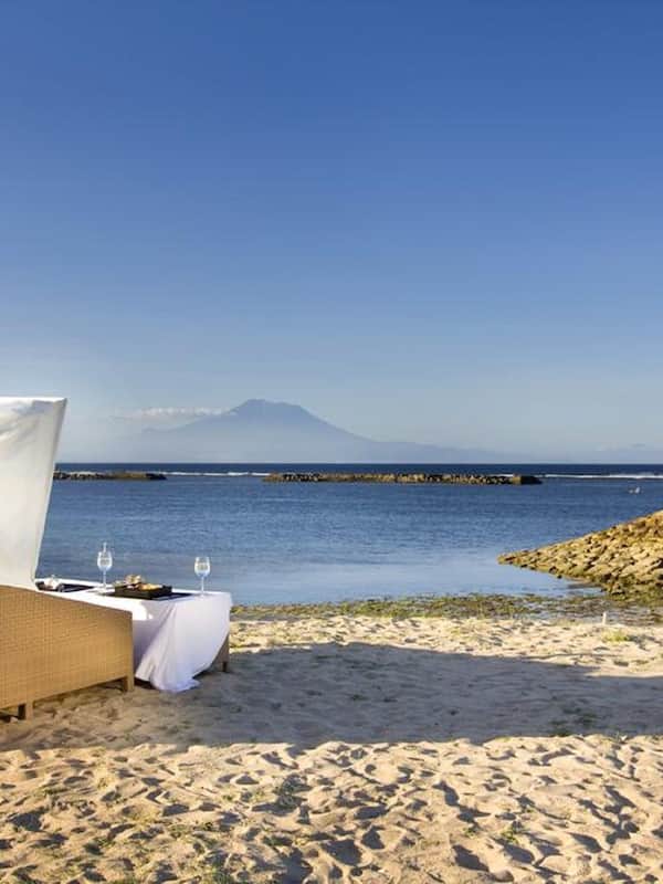 Private beach, white sand, sun loungers, beach umbrellas