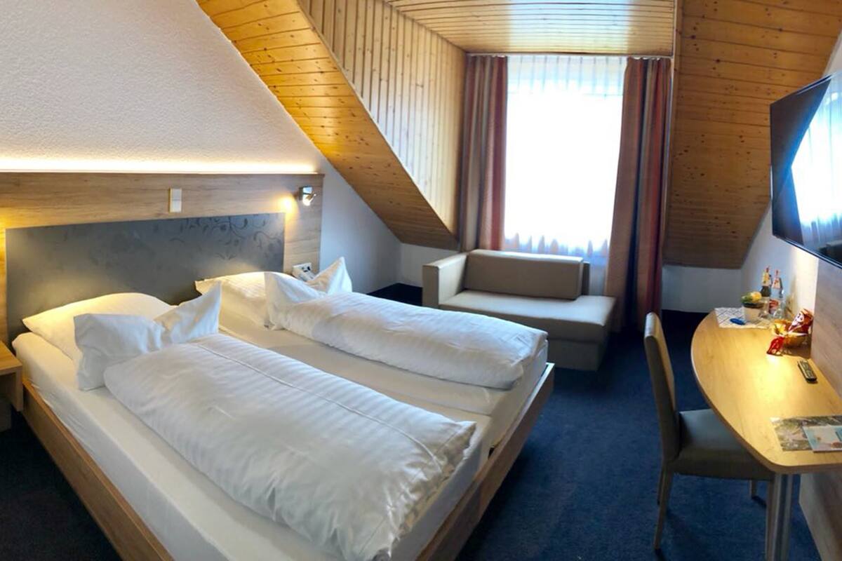 Premium bedding, desk, blackout drapes, iron/ironing board (on request)