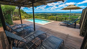 2 outdoor pools, pool umbrellas, sun loungers