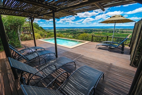 2 outdoor pools, pool umbrellas, sun loungers