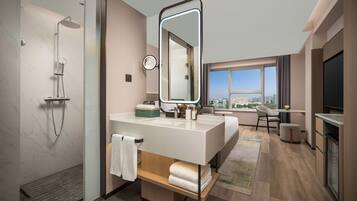 Eco-friendly toiletries, hair dryer, bathrobes, slippers