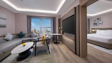 Suite, 1 King Bed, City View | Living area