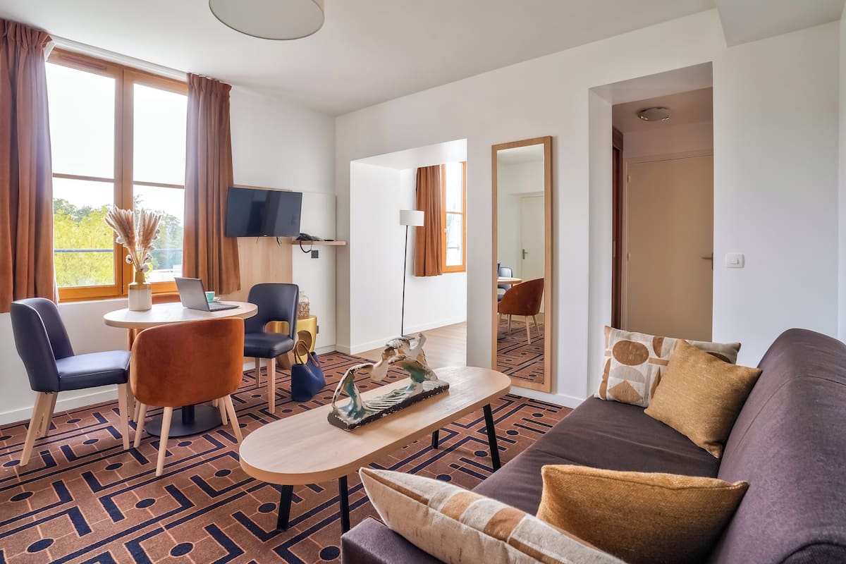 Apartment, 1 Bedroom | Living area | Plasma TV