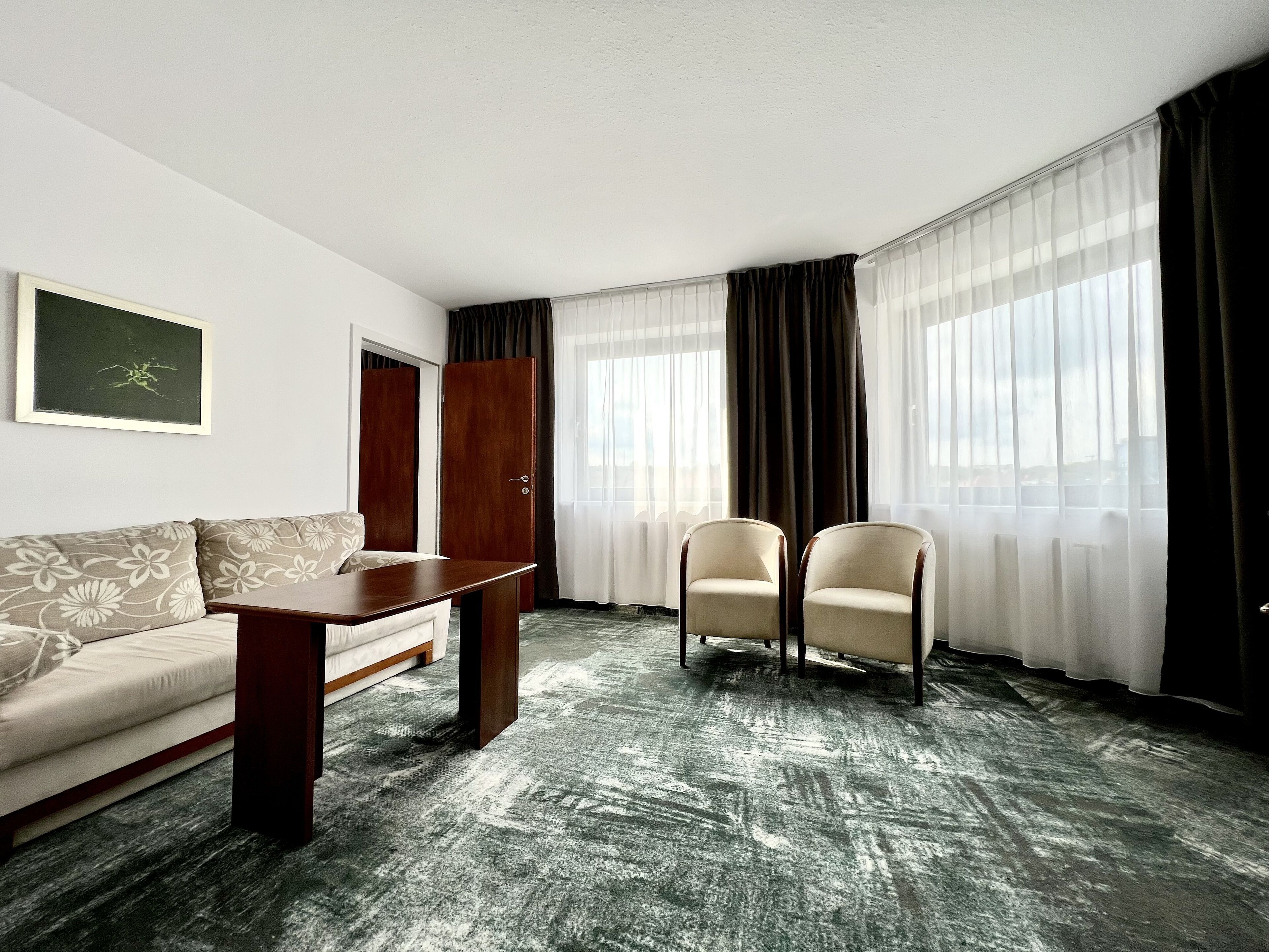 classic suite | living room | 32-inch lcd tv with satellite channels, tv, books