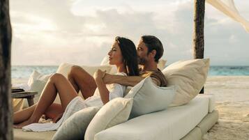 Private beach, white sand, free beach cabanas, sun loungers