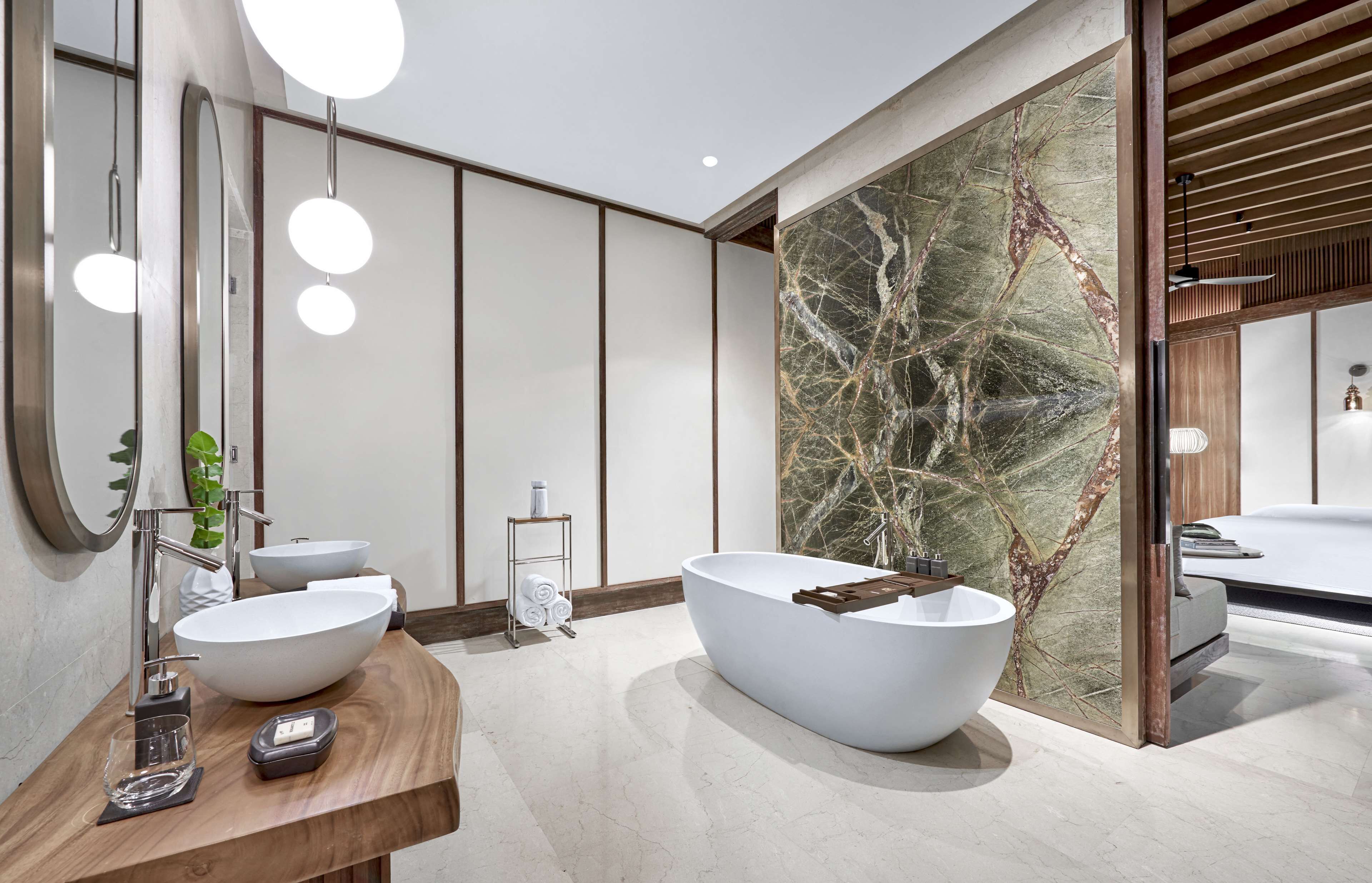 kiaali residence | bathroom | separate bathtub and shower, deep-soaking bathtub, rainfall showerhead