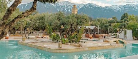 Outdoor pool, open 9:00 AM to 7:30 PM, pool umbrellas, pool loungers