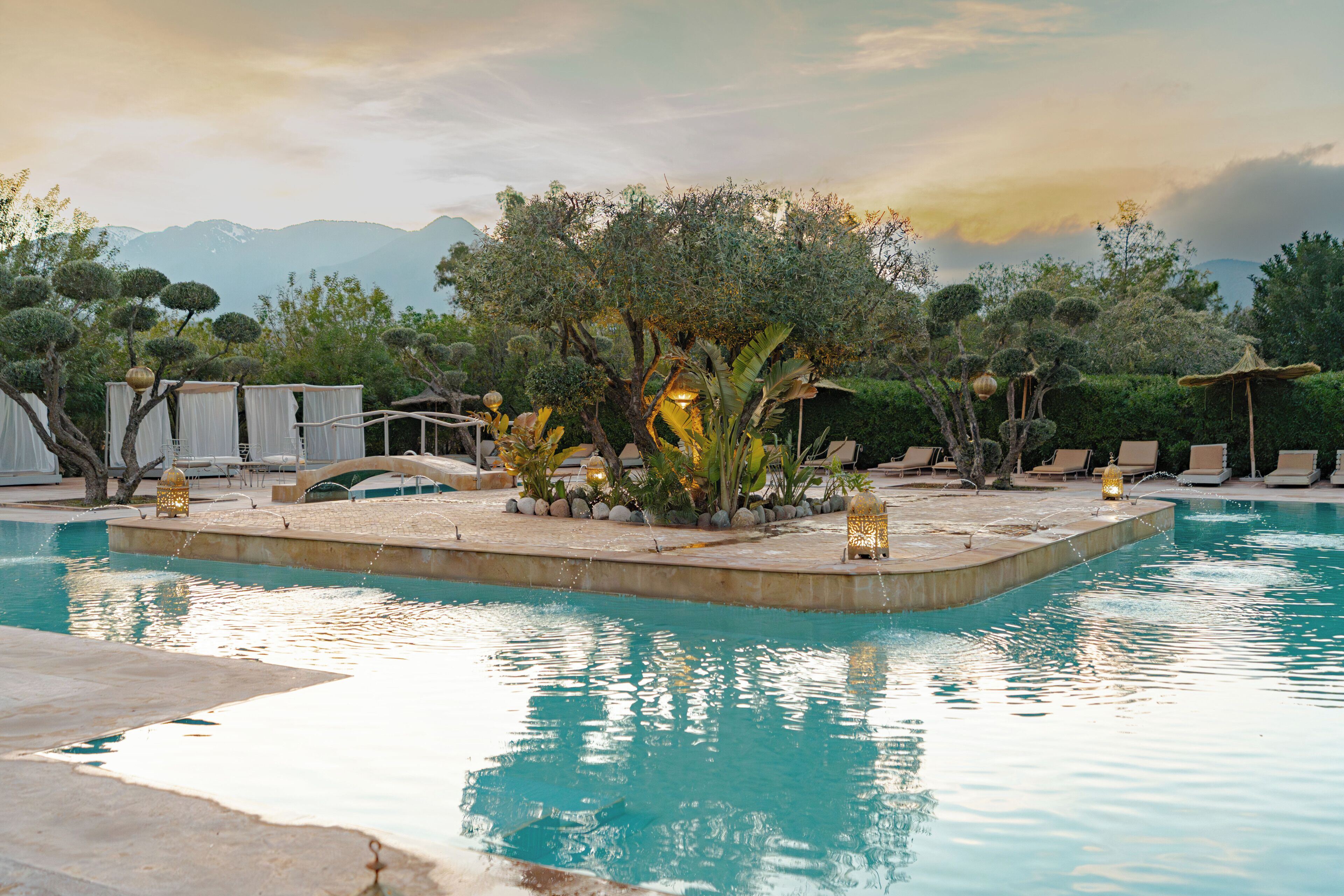 Outdoor pool, open 9:00 AM to 7:30 PM, pool umbrellas, pool loungers