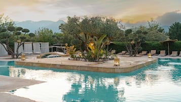 Outdoor pool, open 9:00 AM to 7:30 PM, pool umbrellas, pool loungers