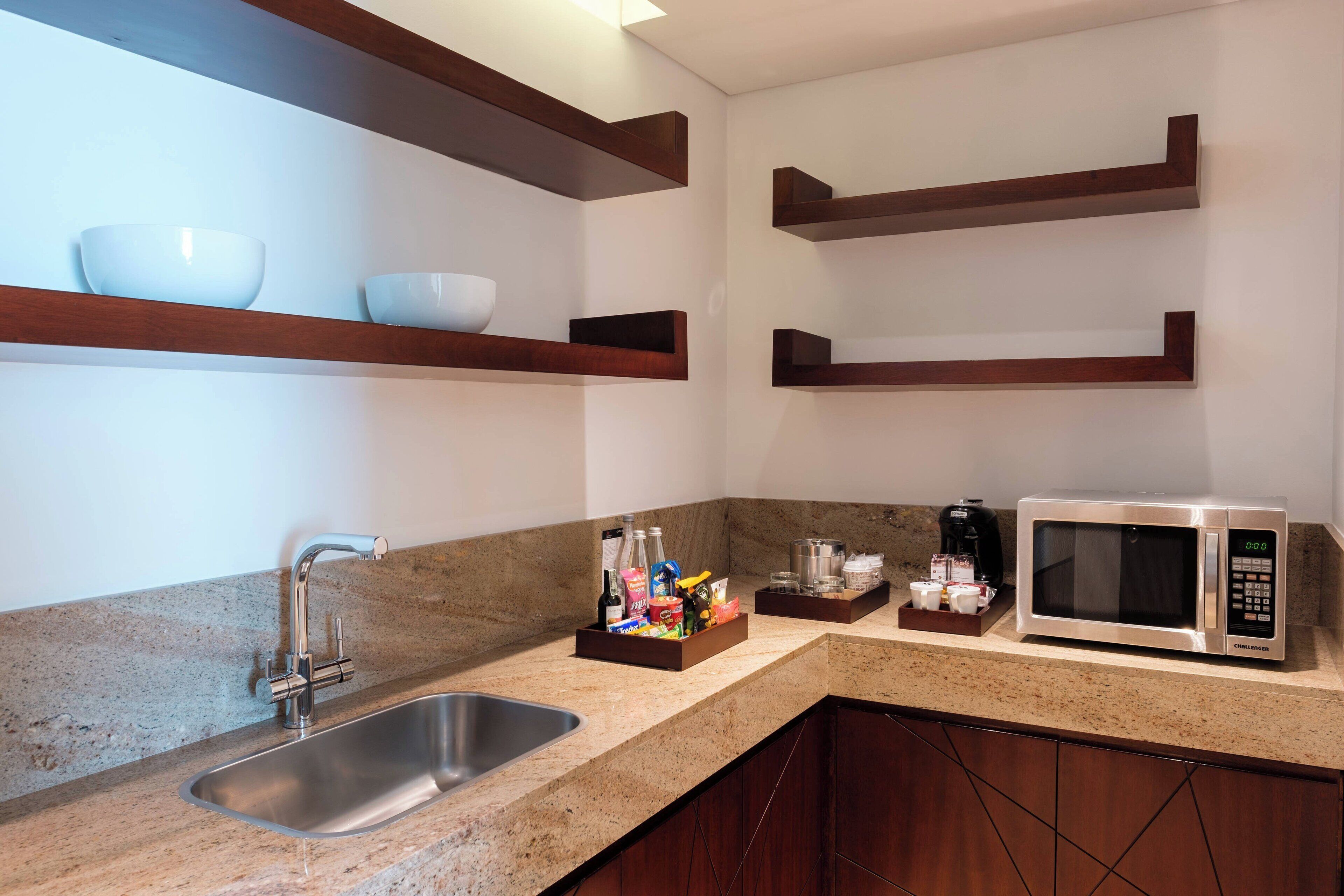 presidential studio suite, 1 bedroom | private kitchen | coffee/tea maker
