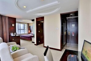 Habitación Elite | Ropa de cama de alta calidad, edredón, camas con pillow-top y minibar 