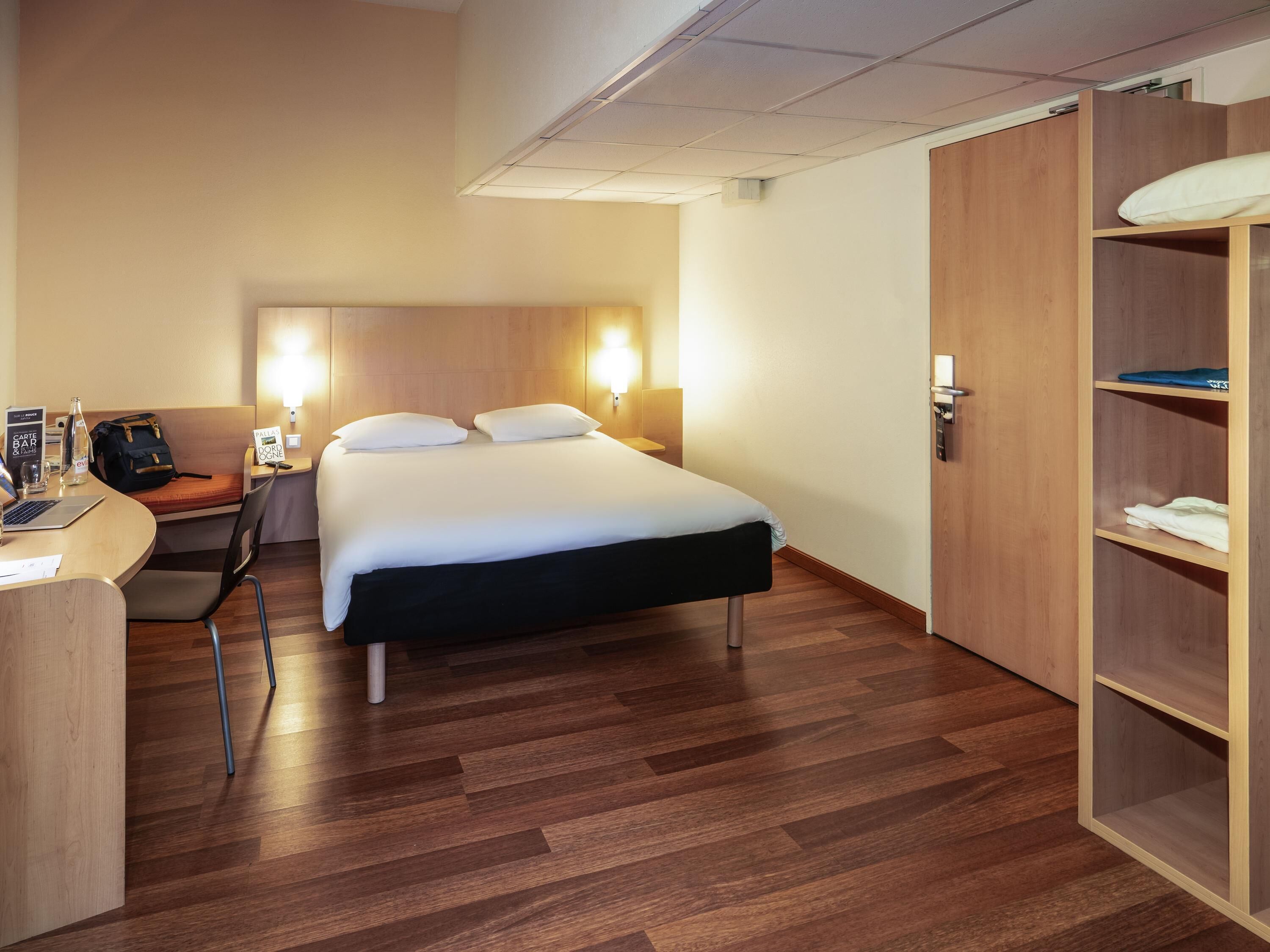 premium bedding, desk, laptop workspace, blackout curtains