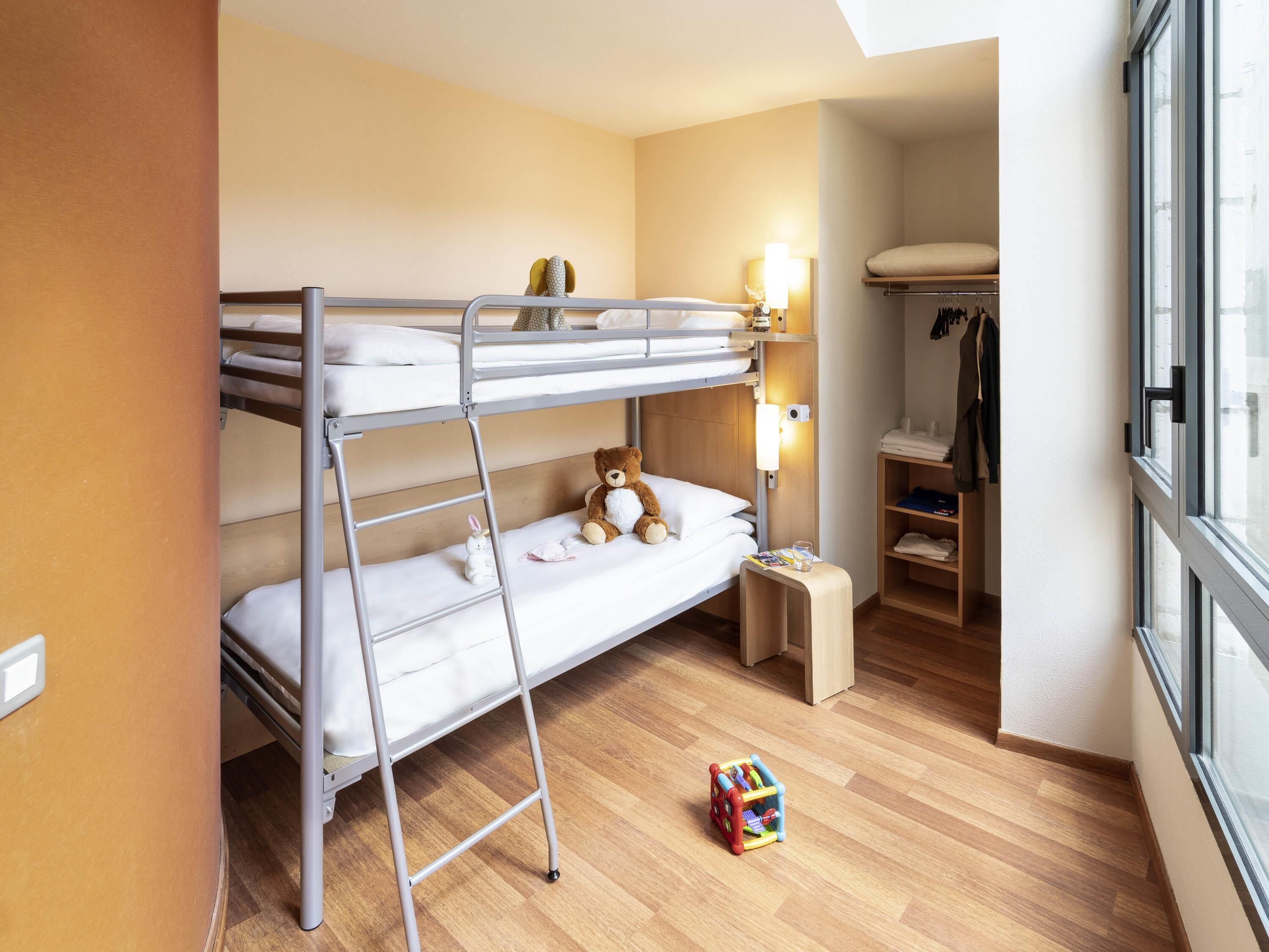 family room | premium bedding, desk, laptop workspace, blackout curtains