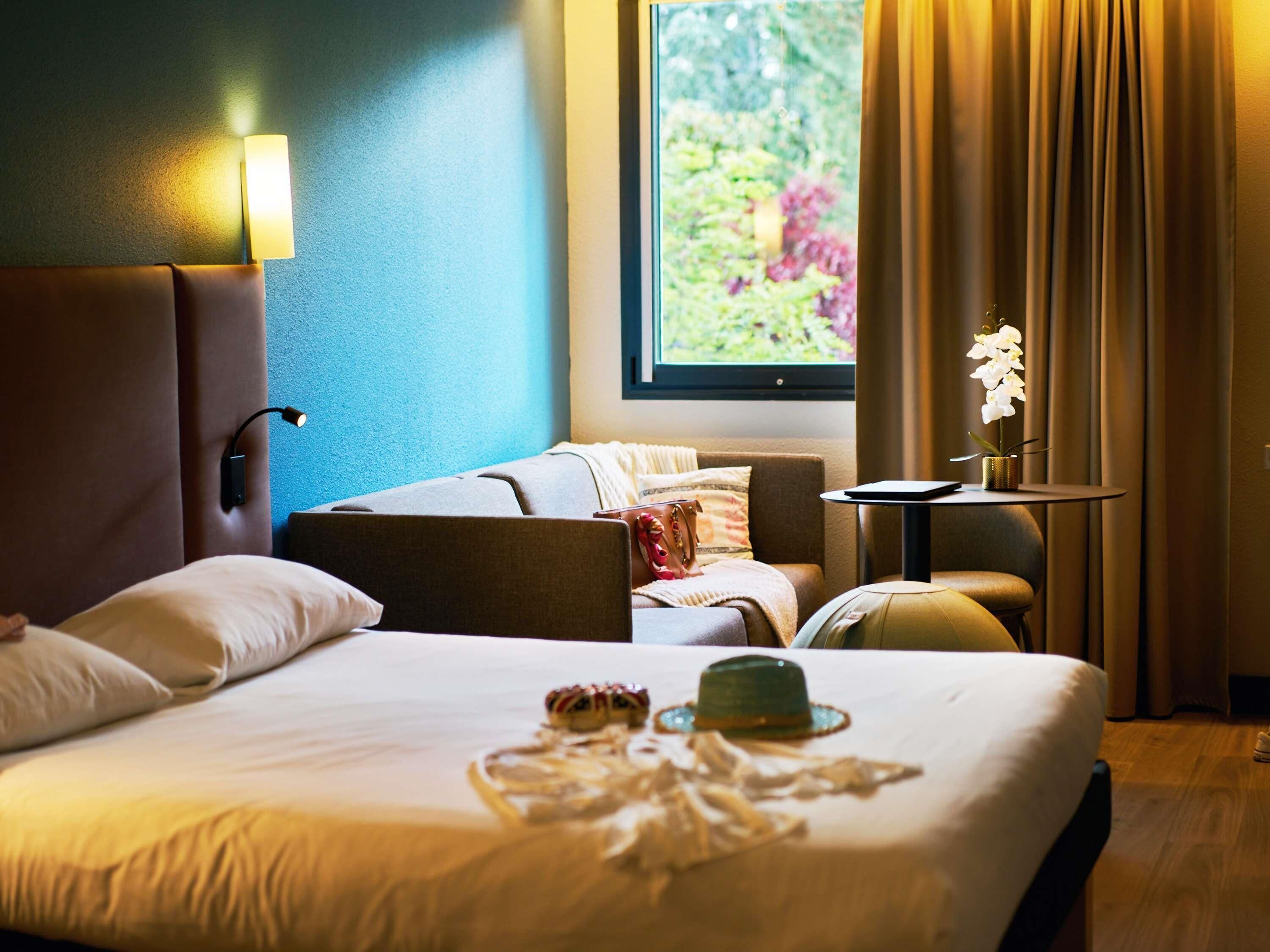 Premium bedding, pillow-top beds, desk, laptop workspace