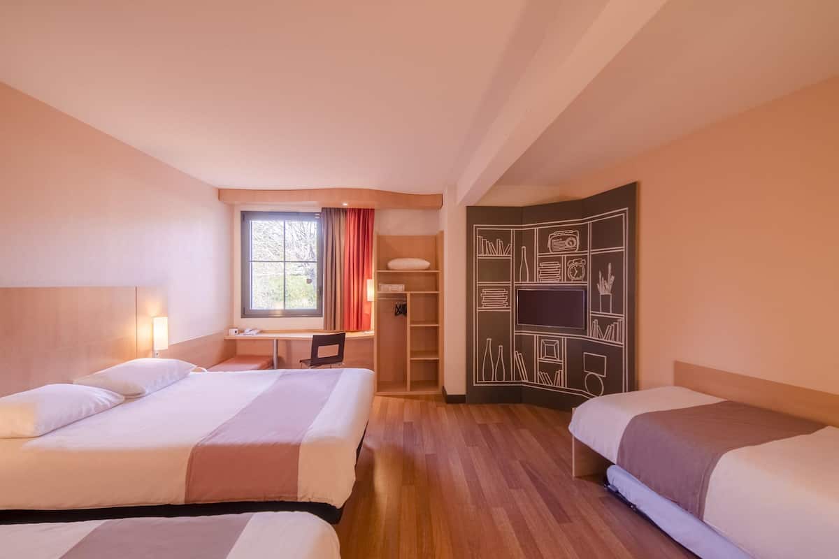 premium bedding, desk, laptop workspace, blackout curtains