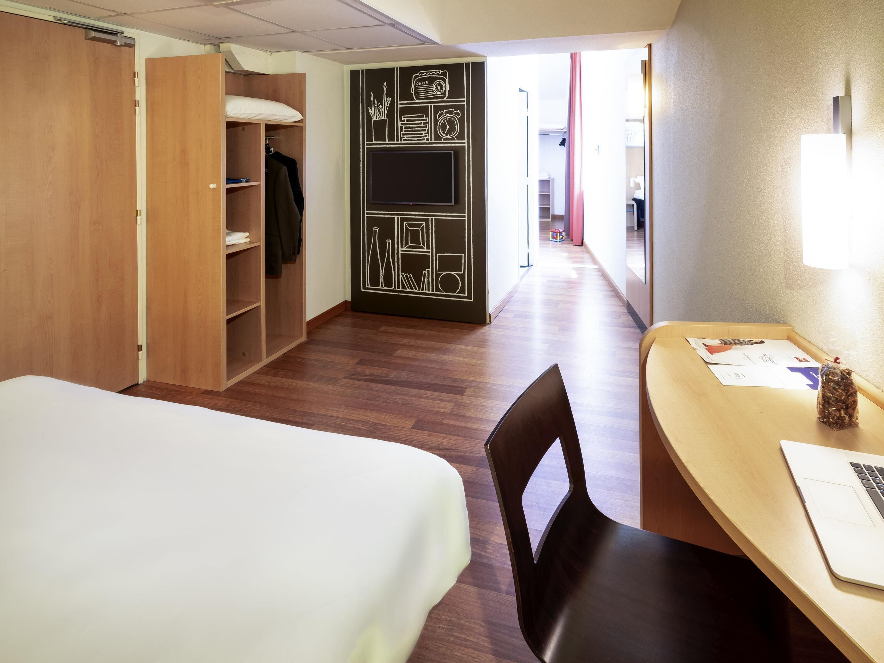 premium bedding, desk, laptop workspace, blackout curtains