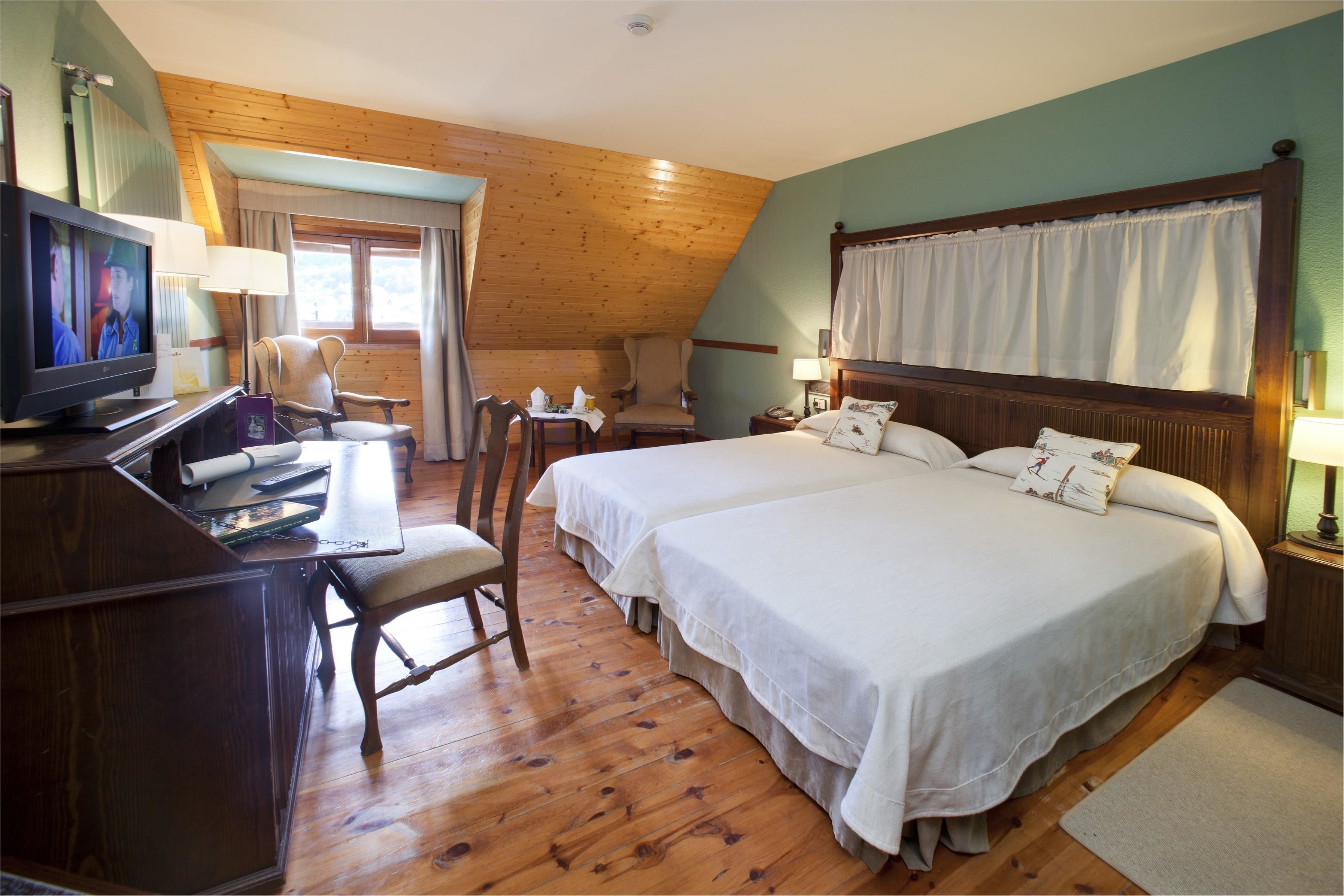 Luxe beddengoed, een minibar, een kluis op de kamer, een bureau